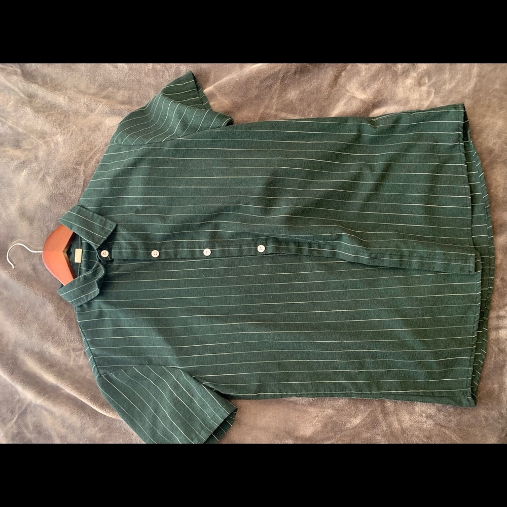 Green button up shirt